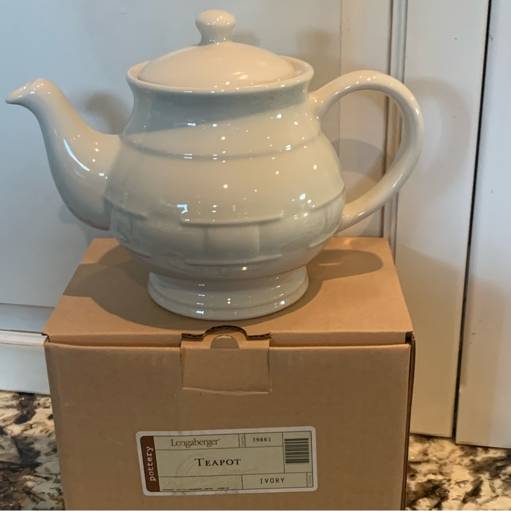 Longer Berger new in the box ivory woven traditions teapot.